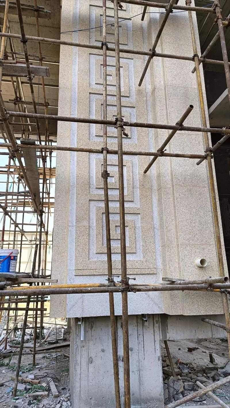 朝阳 黄金麻花岗岩别墅外墙干挂回纹造型效果